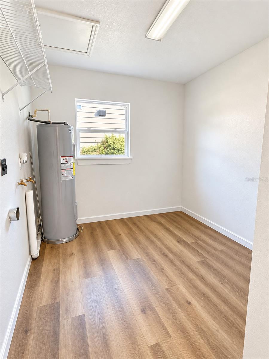 Utility room, also laundry room, with built in closet  (where washer and dyer will be)