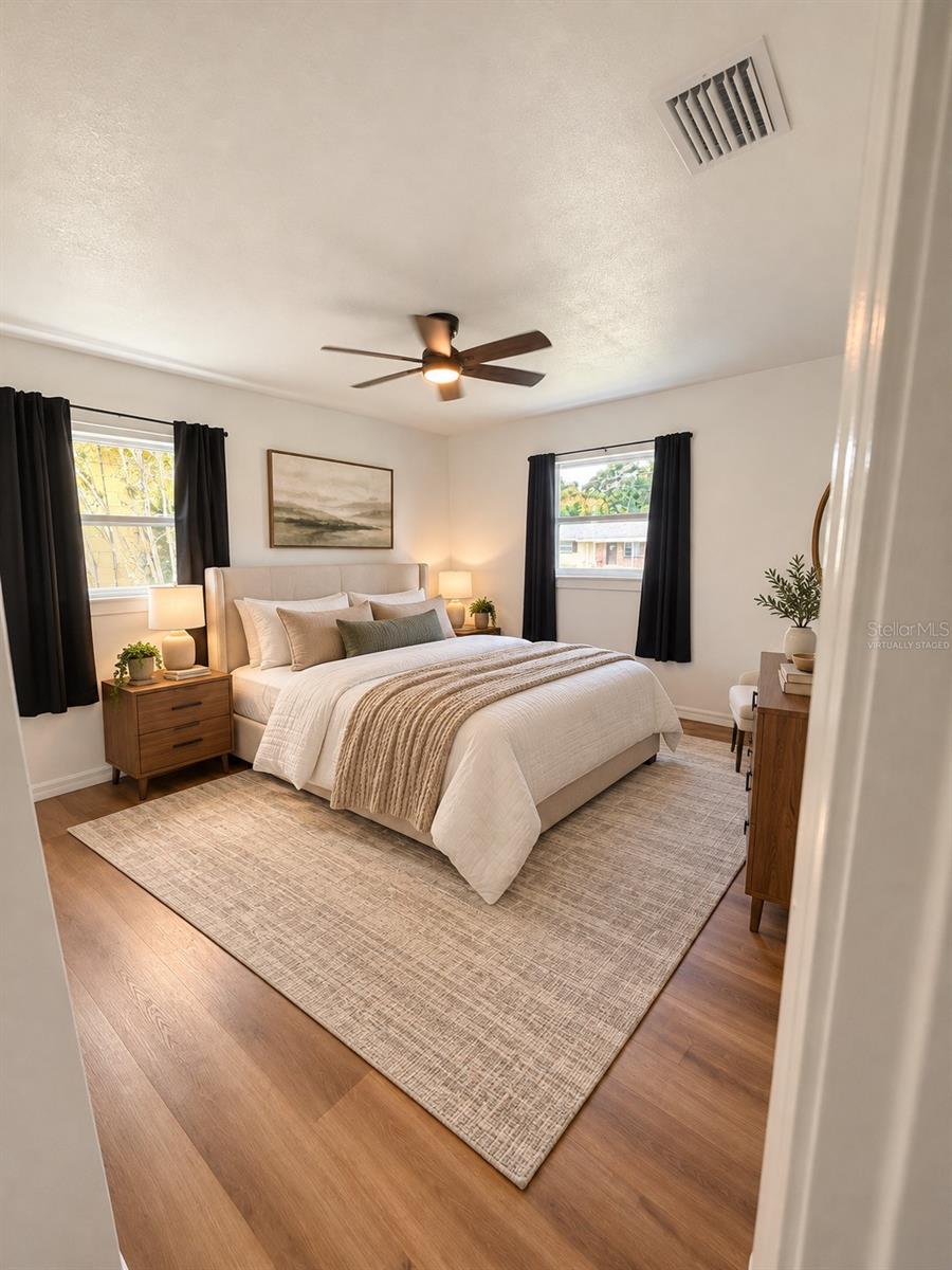 Virtually staged bedroom showcasing its potential as a comfortable guest room.
