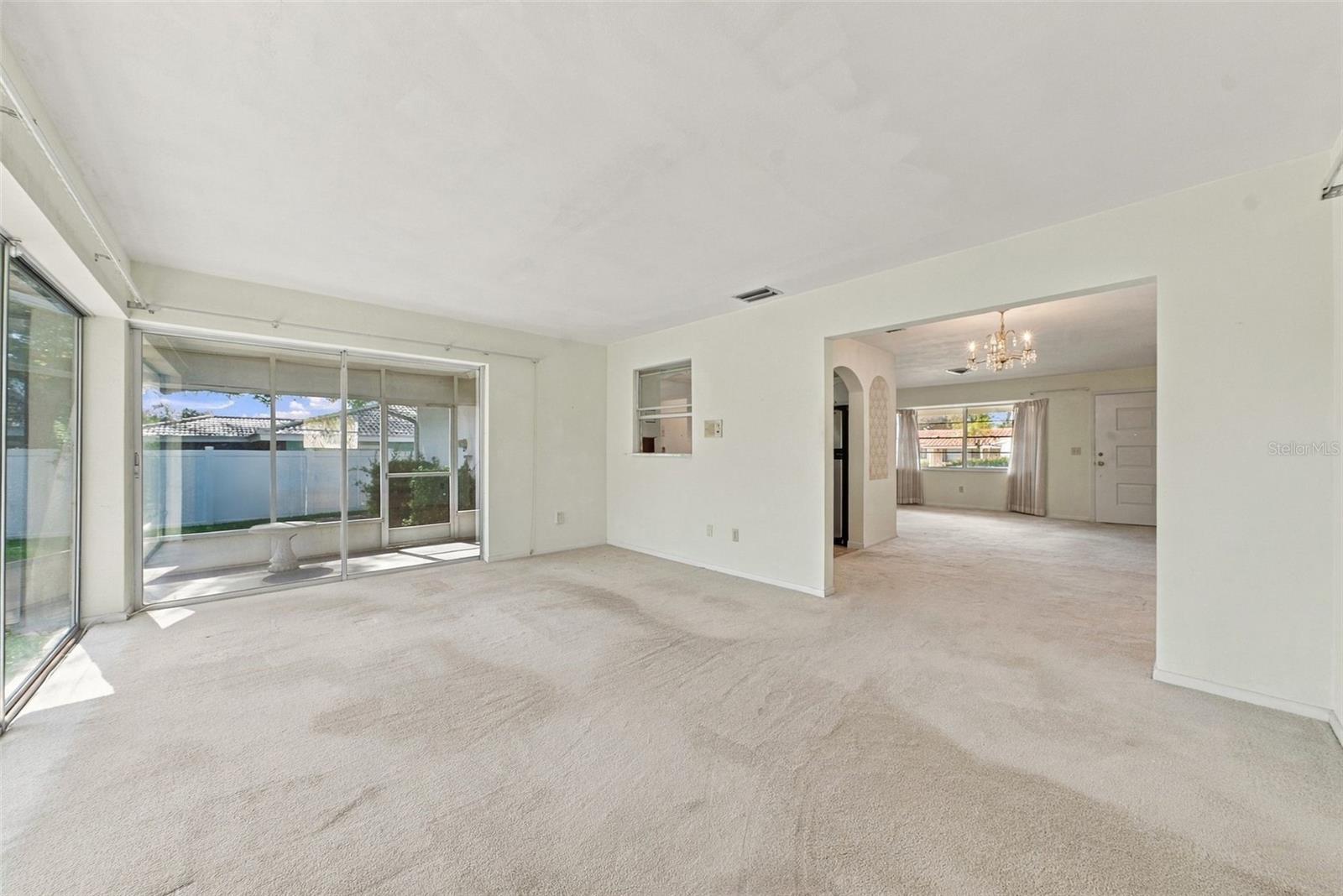 Bright, open sunroom that can be turned into a second living room space