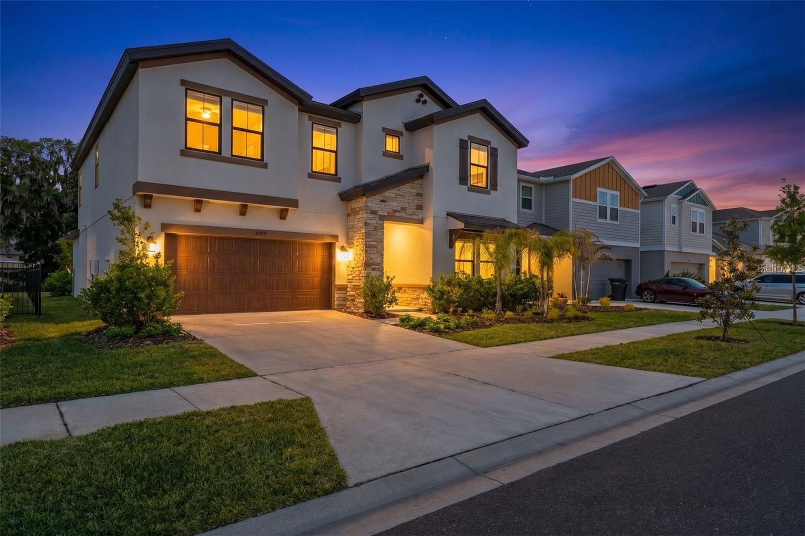 2024 concrete block home with stone accents and a 2-car garage 2024 concrete block home with stone accents and a 2-car garage