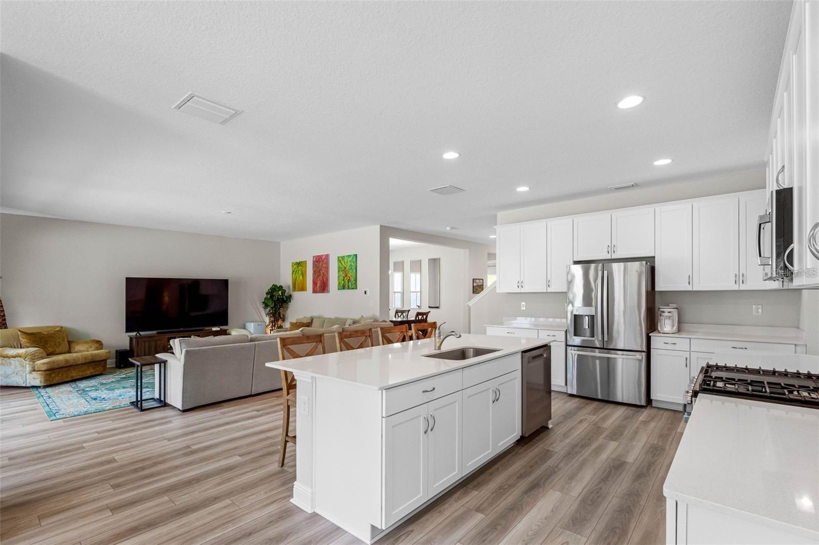 Open floor plan connecting the kitchen and great room Open floor plan connecting the kitchen and great room