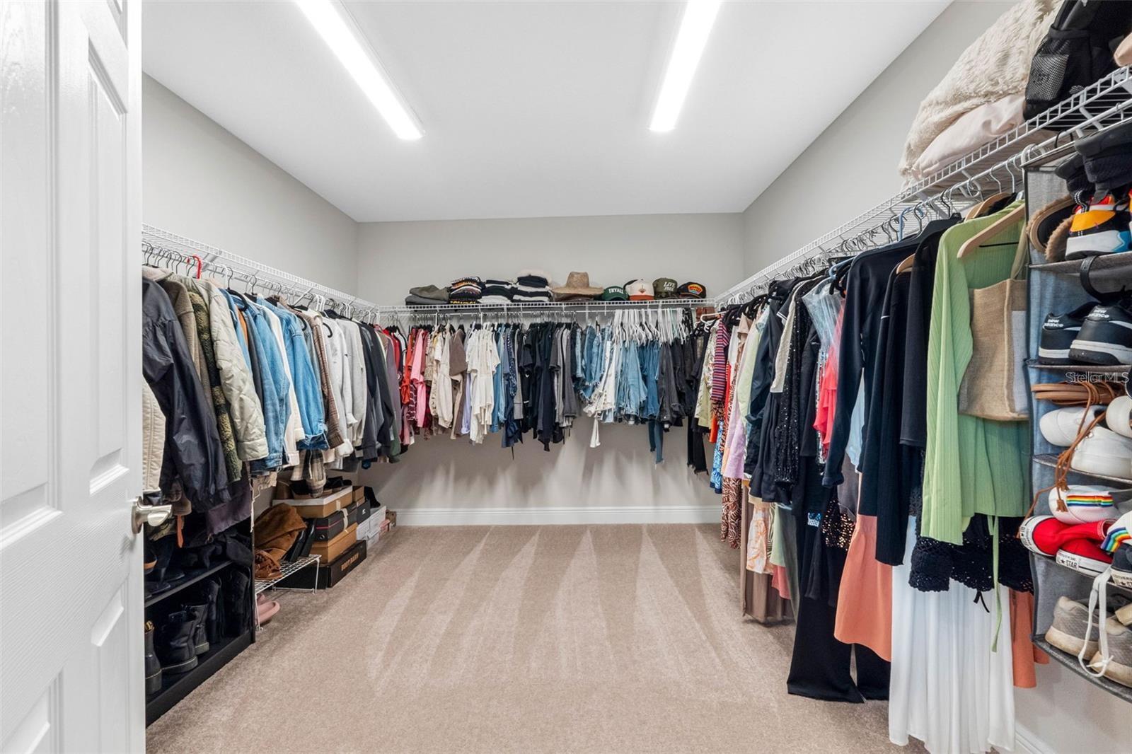Oversized walk-in closet in the primary suite