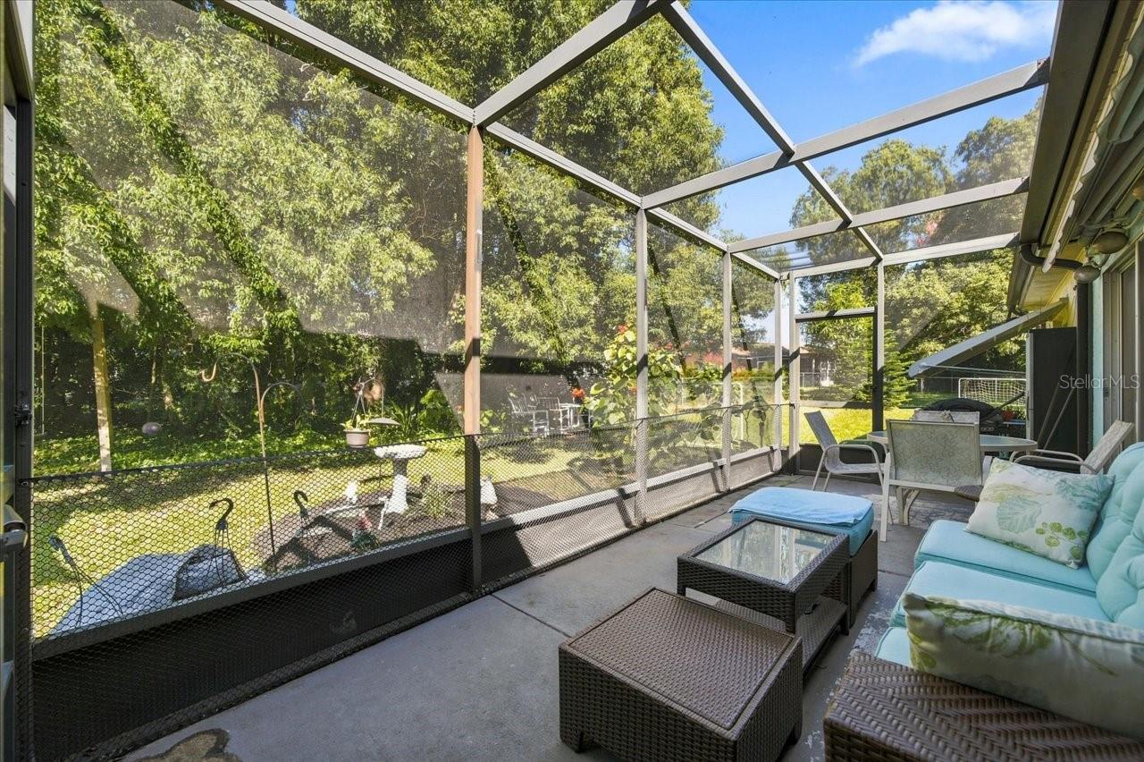 Screen in Patio with an Retractable Awning