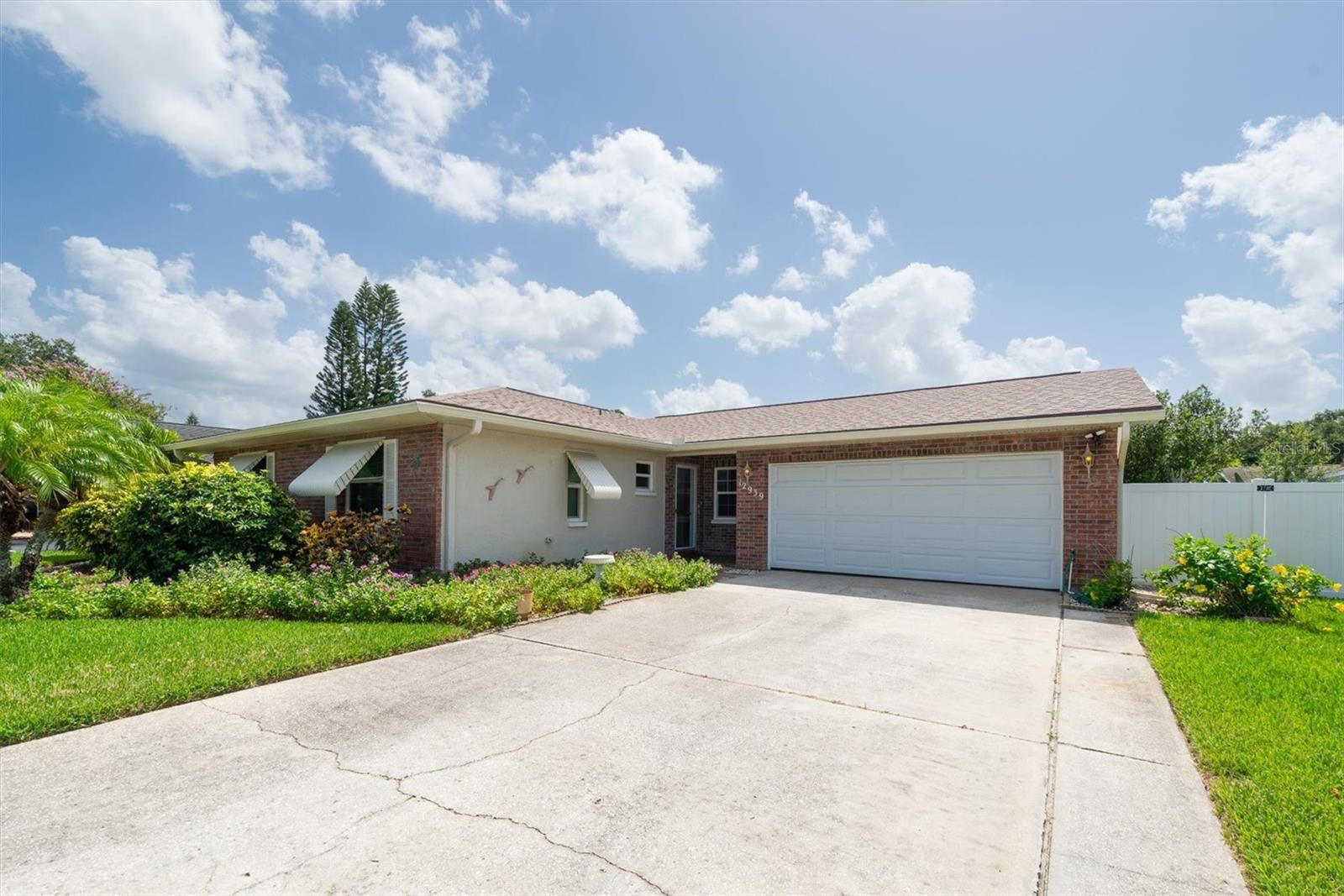 Front of the home with large driveway