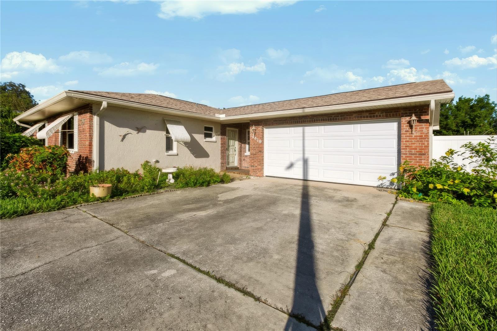 Front of the home with large driveway