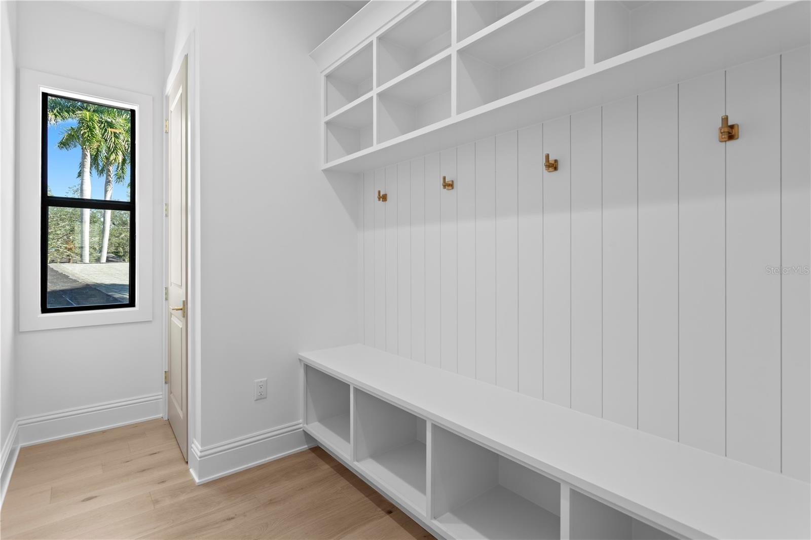 Mudroom with secondary stackable washer/dryer hook up