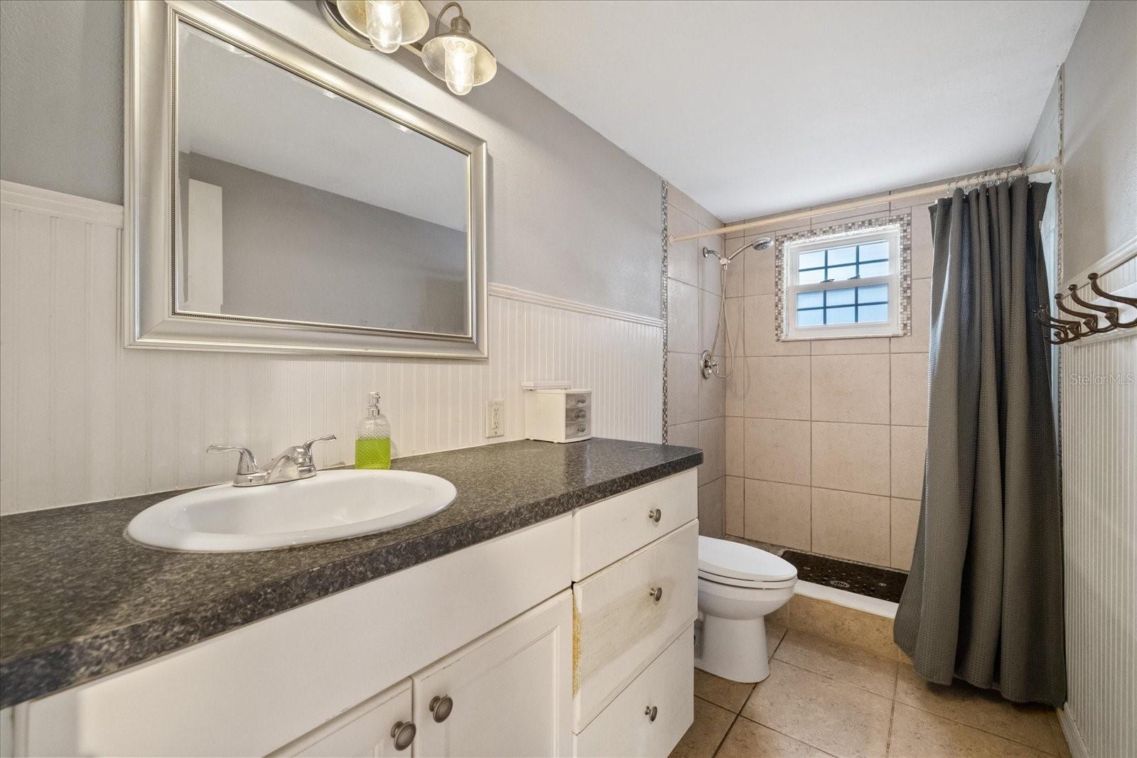 Bathroom 1 with Step in Shower
