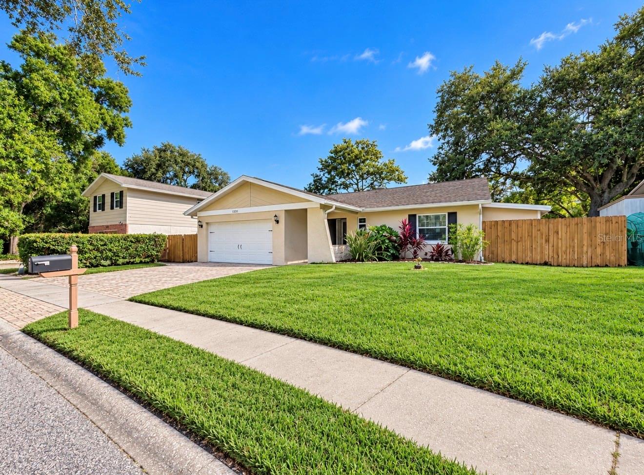 Front of home w/sprinkler system