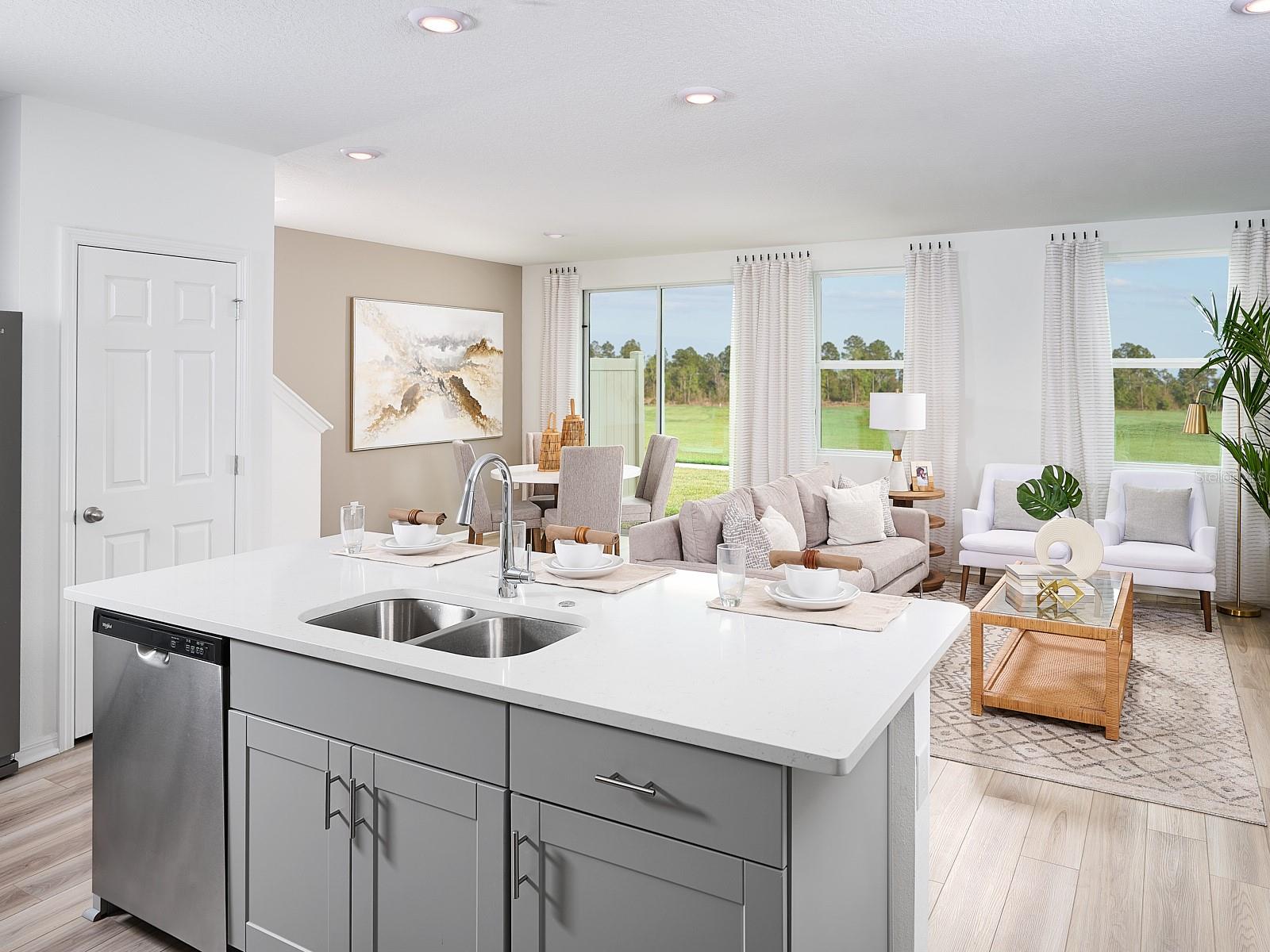 Welcome to Cagan Crossings West, where comfort, style, and functionality come together in a thoughtfully designed home. This versatile floorplan features three spacious bedrooms and two full baths, offering the ideal blend of everyday convenience and modern living. The open-concept kitchen flows seamlessly into the dining area and great room, creating an inviting space perfect for entertaining guests, gathering with family, or simply relaxing at the end of the day. Designed with both comfort and flexibility in mind, this charming home offers bright, connected living spaces and a warm, welcoming atmosphere you'll love coming home to.