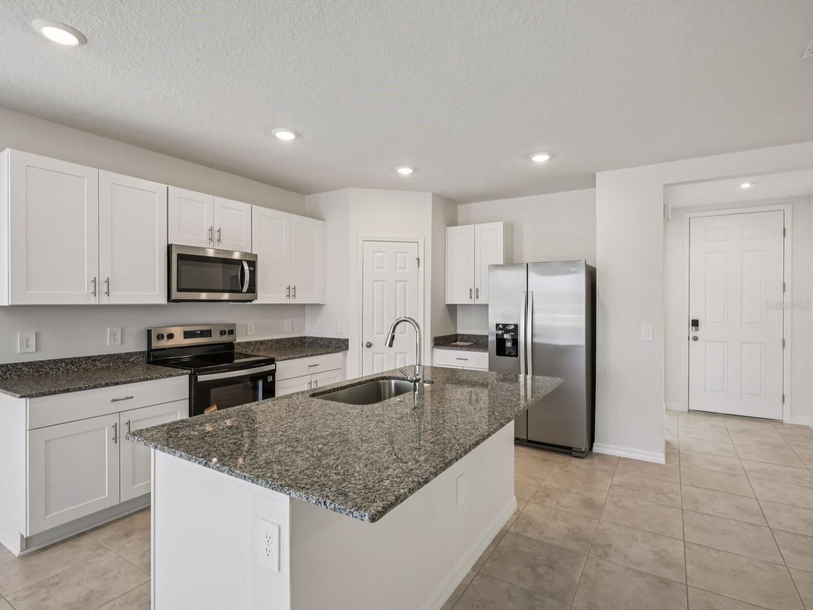 Experience the perfect blend of comfort and sophistication in VillaMar. This thoughtfully designed floorplan offers three spacious bedrooms and two full baths, creating an ideal balance of functionality and style. The heart of the home is the open-concept kitchen, which flows seamlessly into the dining area and great room, providing an elegant setting for both everyday living and effortless entertaining. Designed with modern lifestyles in mind, this inviting residence features a spacious layout, abundant natural light, and a warm, welcoming ambiance. Whether hosting friends or enjoying a quiet evening at home, VillaMar delivers the comfort, versatility, and timeless appeal you've been looking for. Experience the perfect blend of comfort and sophistication in VillaMar. This thoughtfully designed floorplan offers three spacious bedrooms and two full baths, creating an ideal balance of functionality and style. The heart of the home is the open-concept kitchen, which flows seamlessly into the dining area and great room, providing an elegant setting for both everyday living and effortless entertaining. Designed with modern lifestyles in mind, this inviting residence features a spacious layout, abundant natural light, and a warm, welcoming ambiance. Whether hosting friends or enjoying a quiet evening at home, VillaMar delivers the comfort, versatility, and timeless appeal you've been looking for.