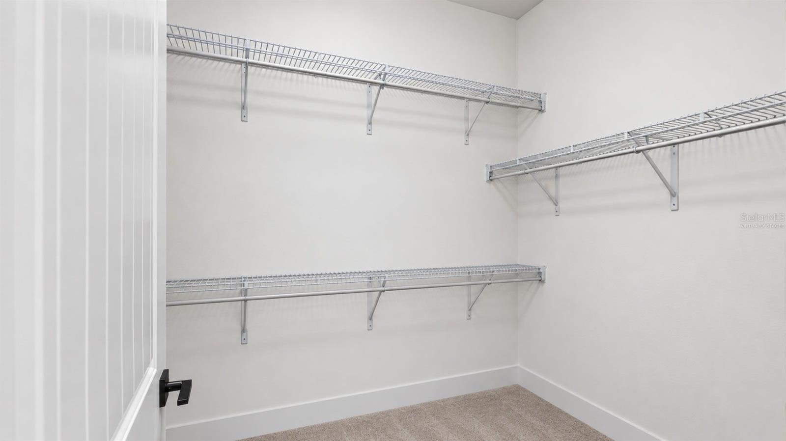 Virtually Staged: Expansive Walk-In Closet