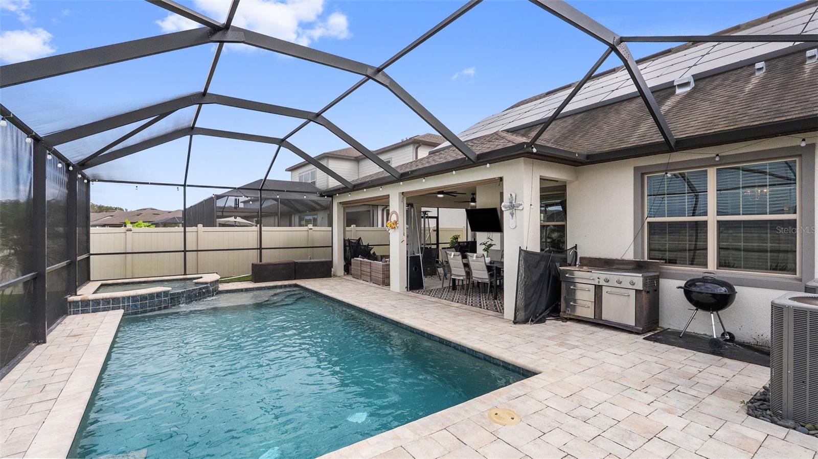 Lanai: Outdoor Kitchen Featuring Utility Sink & Grill