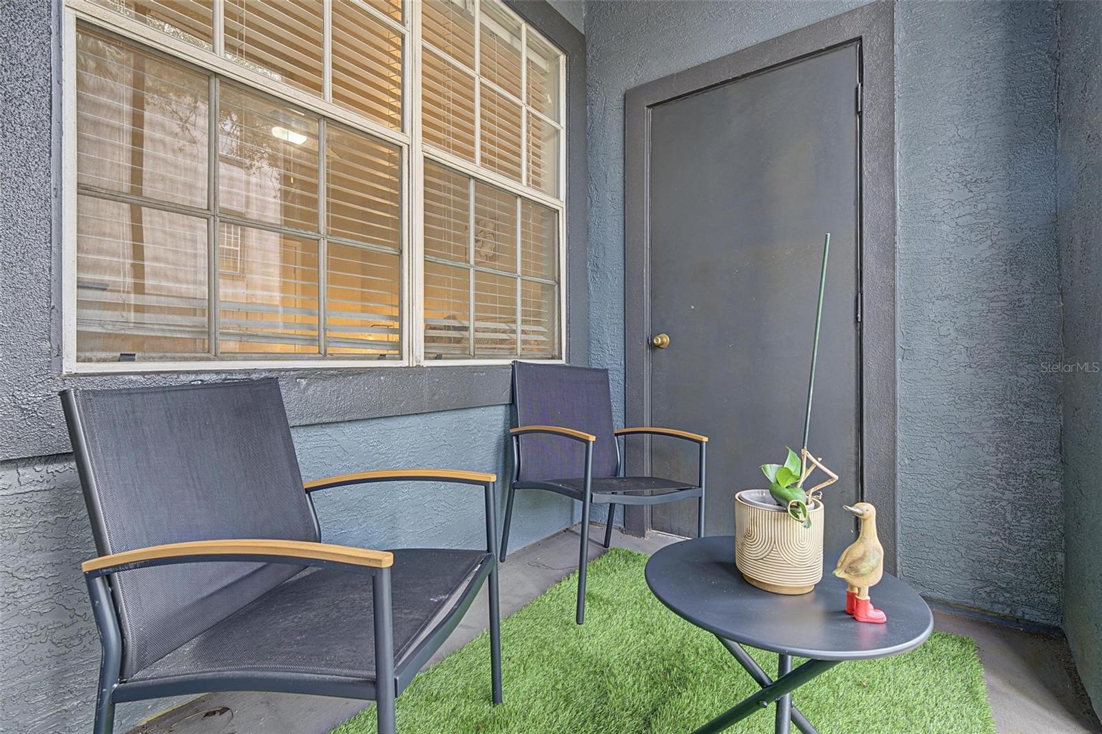 Screened In Back Patio & Storage Room - 13123 Sanctuary Cove Drive - Unit 104