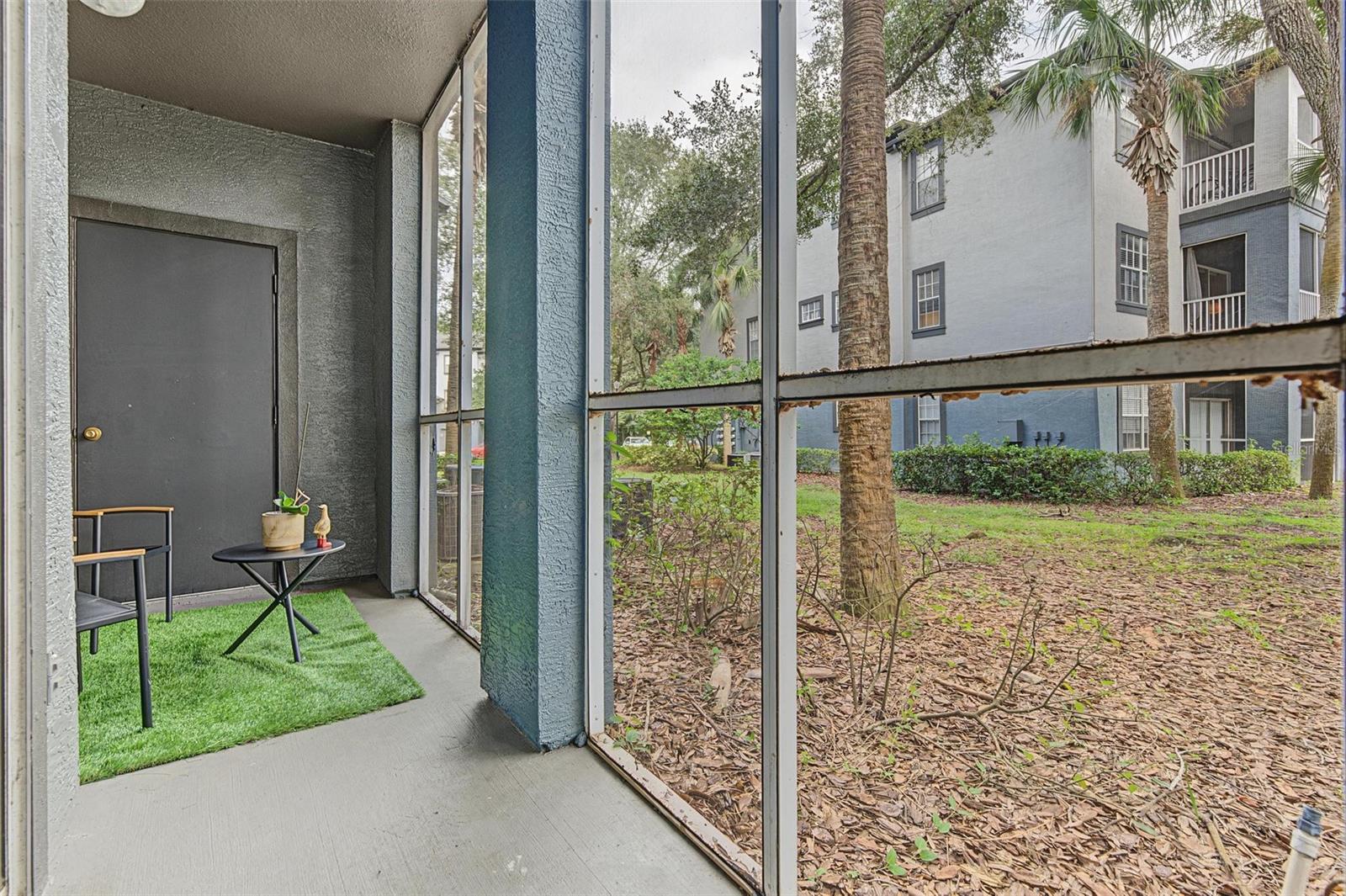 Screened In Back Patio - 13123 Sanctuary Cove Drive - Unit 104
