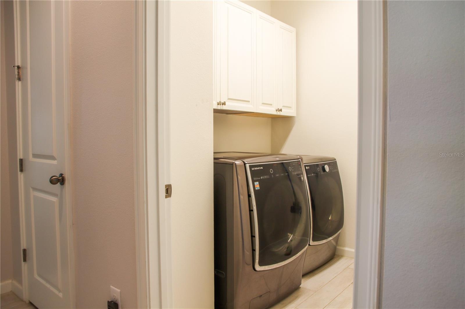 Laundry Room with built in cabinets