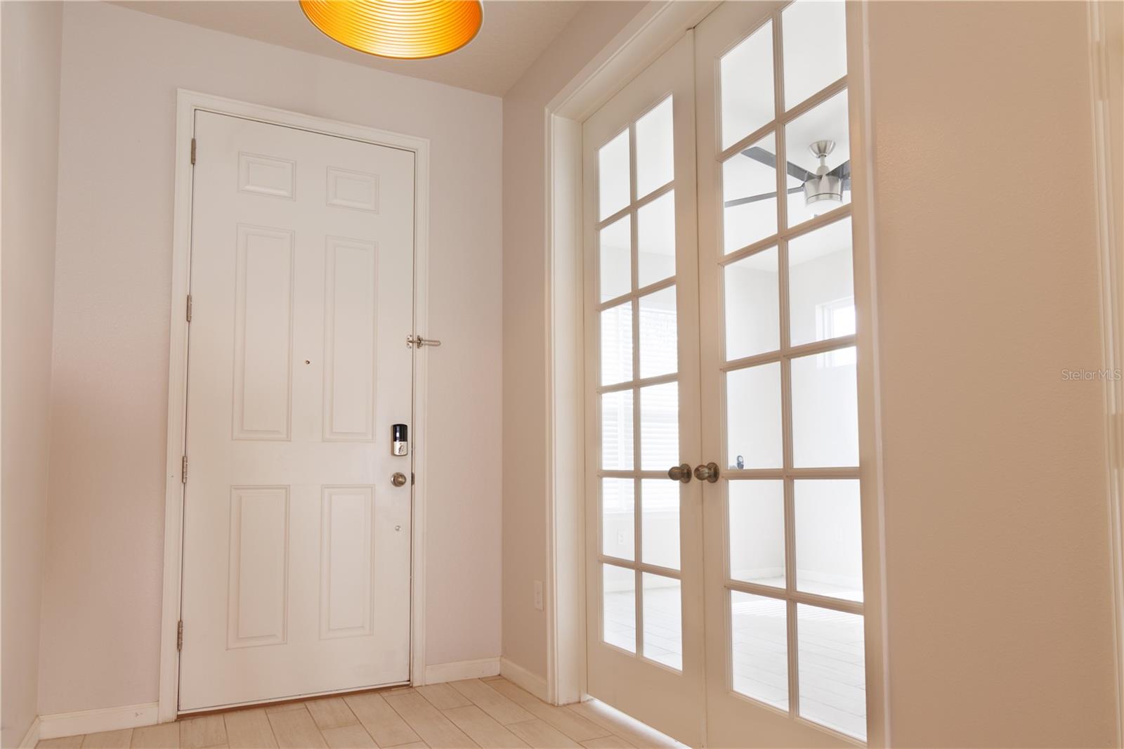 Doors to flex room off front hallway