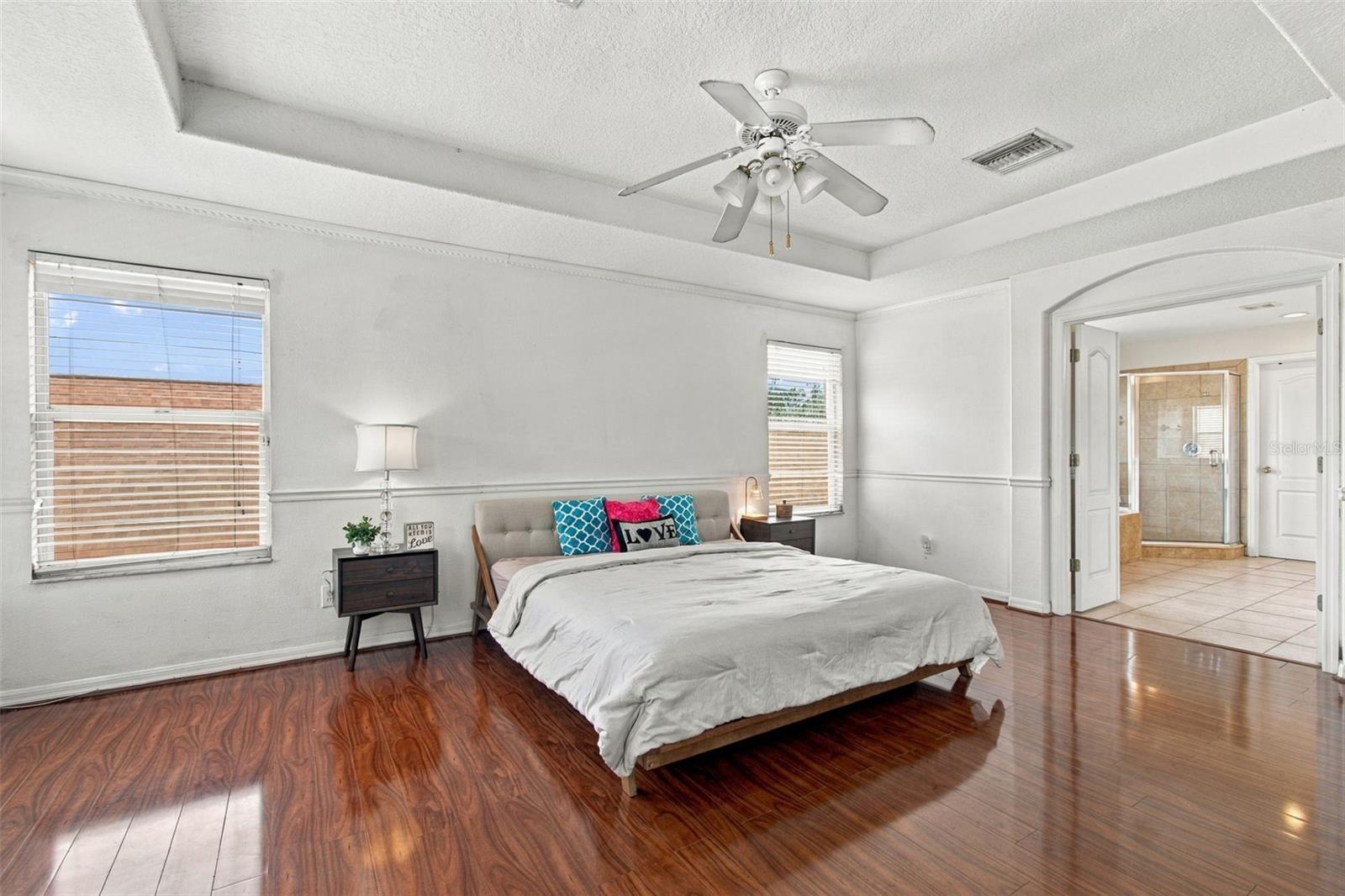 You will love your primary suite with a tray ceiling, chair rails and a flex space.