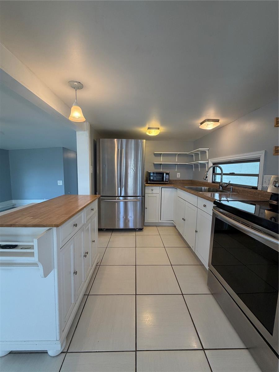 Kitchen with stainless appliances.