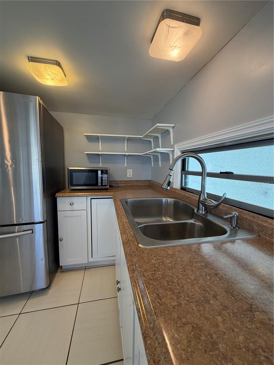 Kitchen with update lighting.