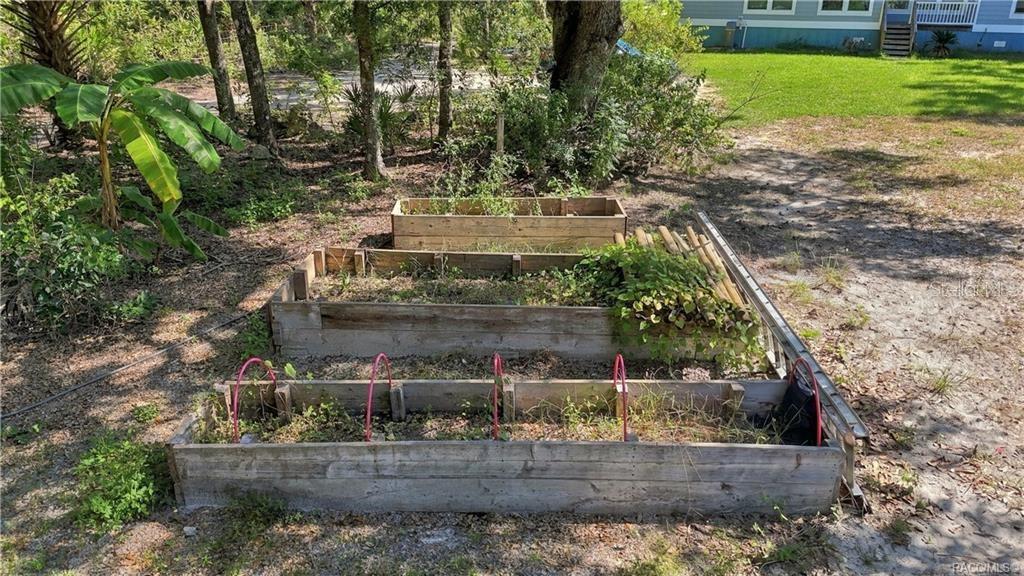 GROW SOMETHING WONDERFUL! Raised wooden garden beds provide a great opportunity to enjoy gardening, grow fresh vegetables, herbs or colorful flowers!