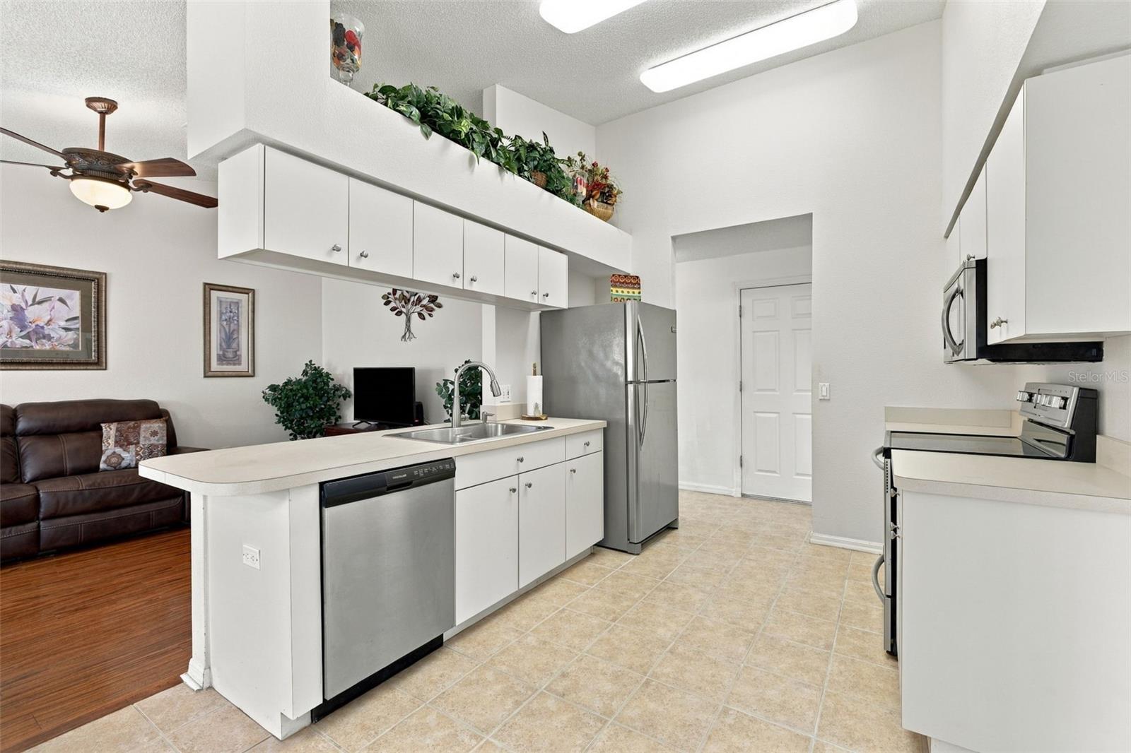 Bright kitchen adjacent to the family room.