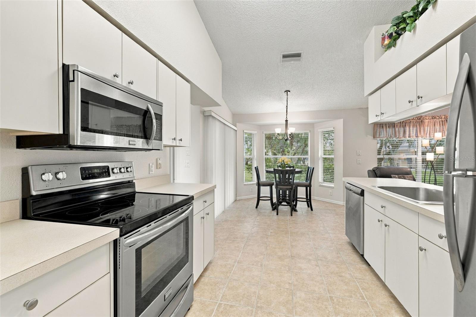 Features stainless-steel appliances and ample cabinet/storage space