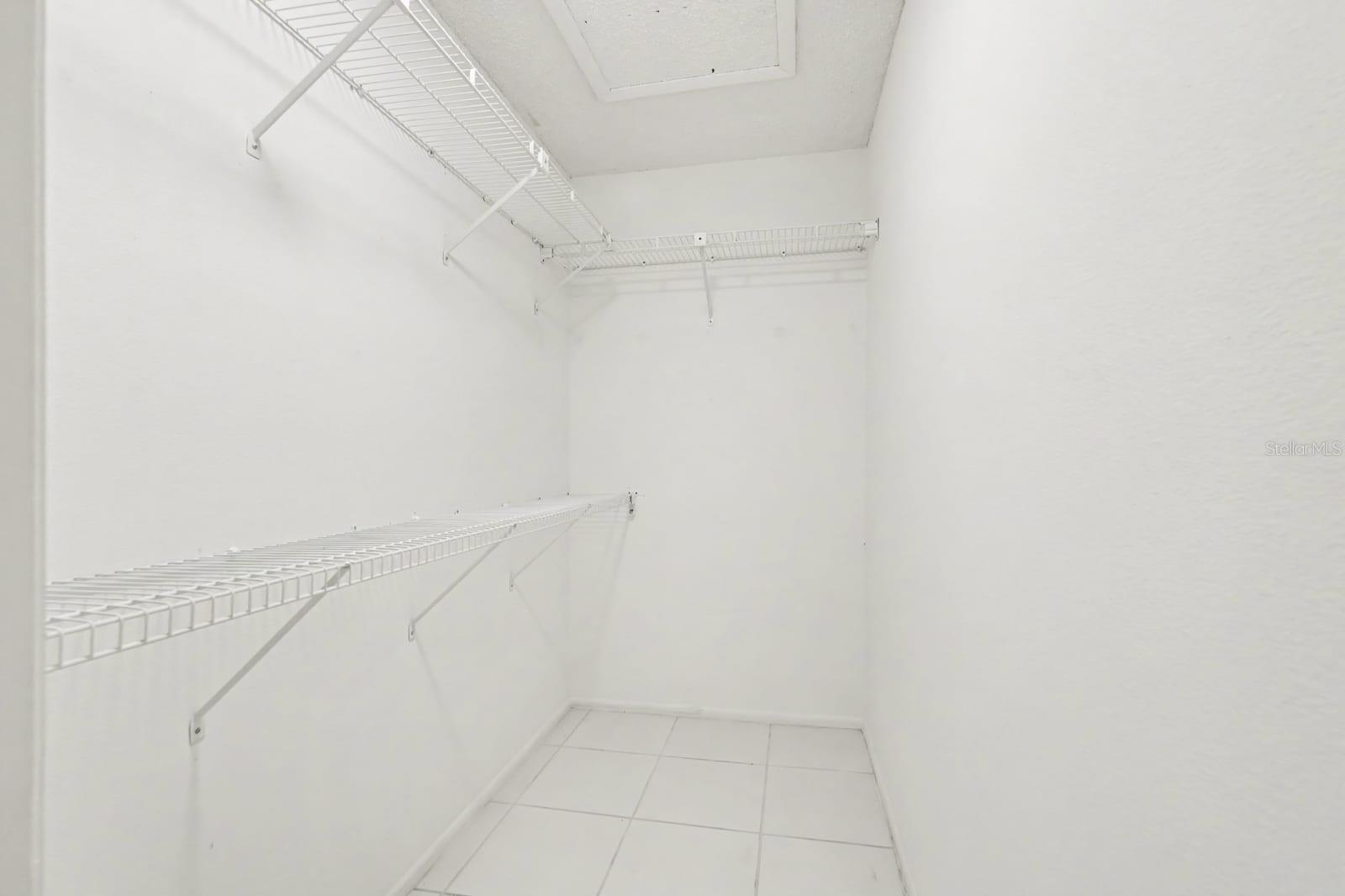 Dedicated Laundry Room with Wire Shelving for Storage Organization