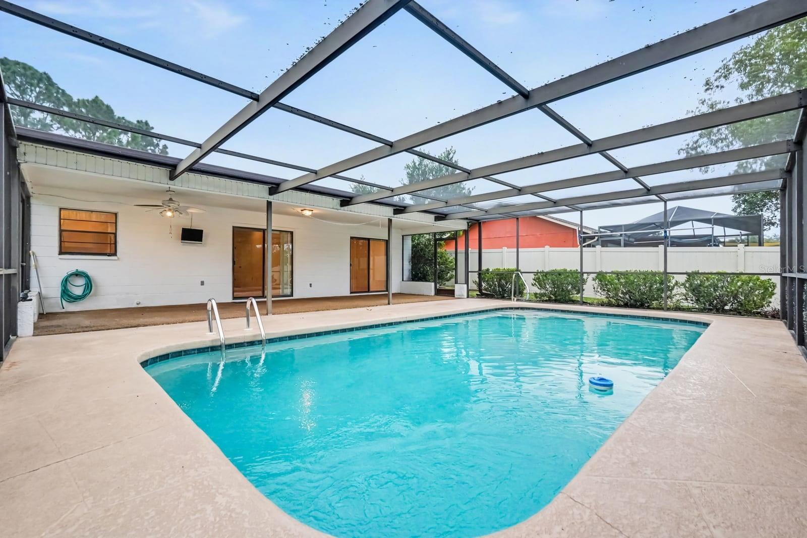 Indoor Pool Area with Polycarbonate Roof and Ample Lounging Space