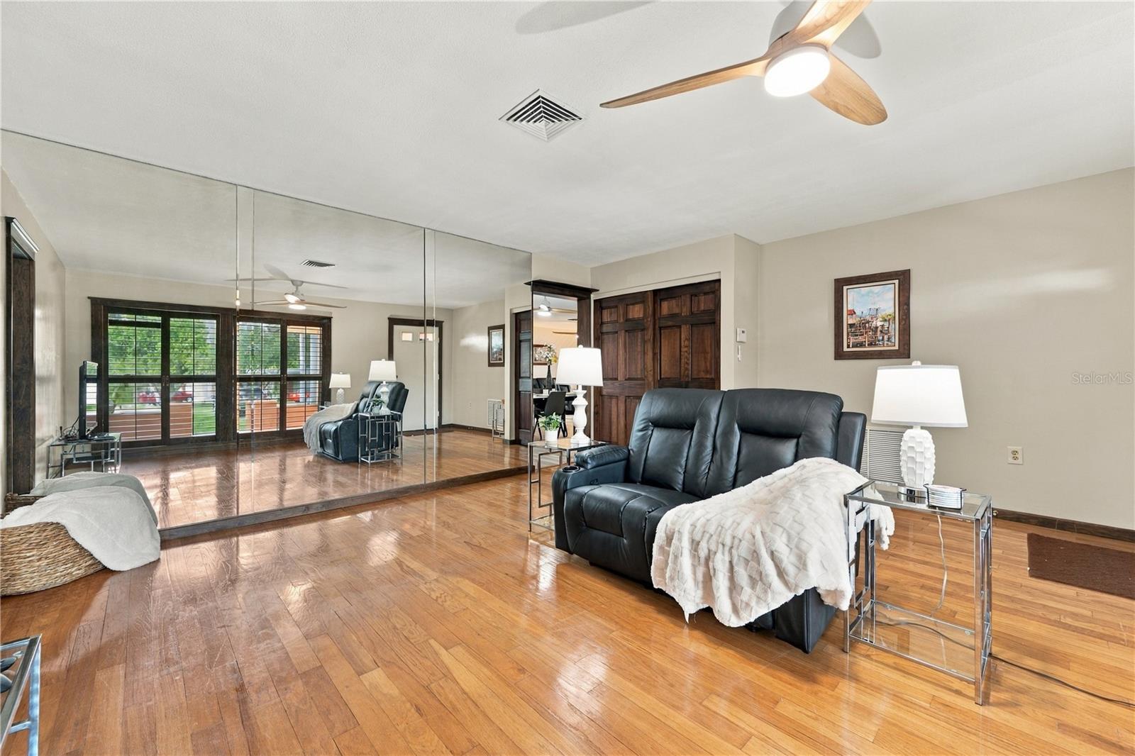 12.Front Living Room is (12.7 x 15') .. Features Timeless Wood Flooring that Lasts!
