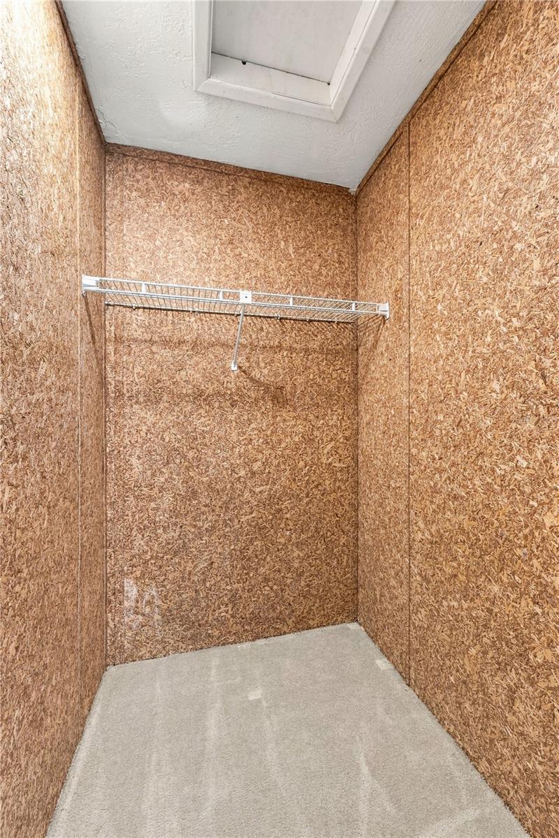26a. Walk In Closet (5.3 x 4.3') is a Super Spacious Cedarboard Style w Attic Access.