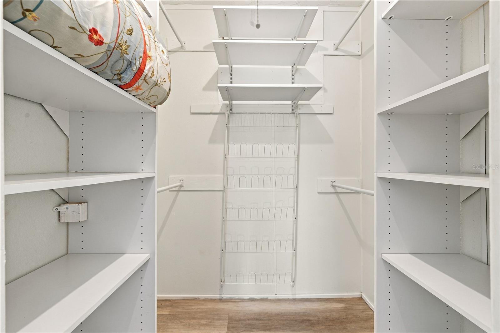 62. Walk in Closet (4.9 x 5.7') for Primary Bedroom .. Plenty of Storage!