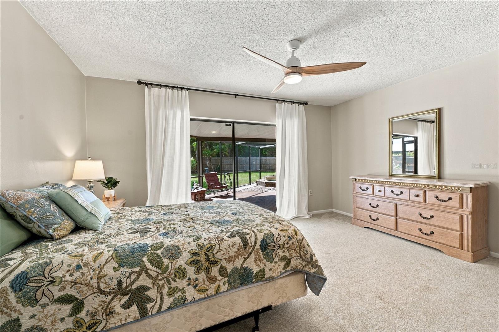 25. Bedroom #2 (11.7 x 15) Features Oversized Sliders to Lanai!