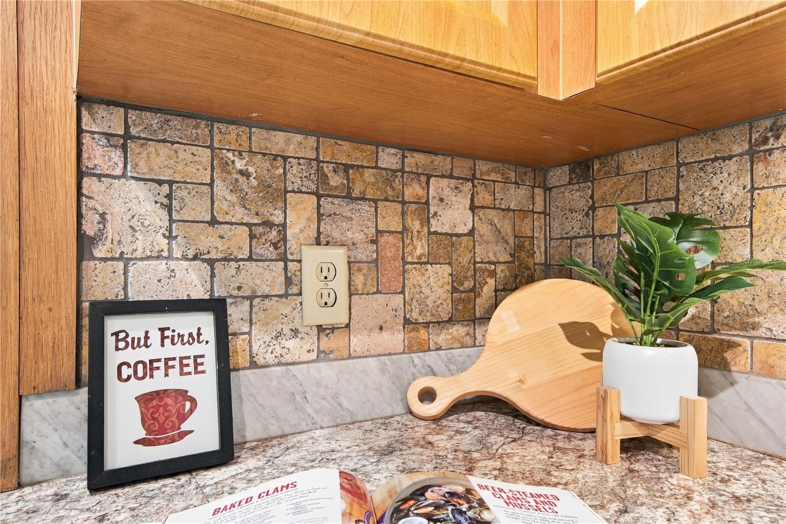 52. Complimentary Backsplash is Warm & Adds a Touch of Thoughtful Elegance!