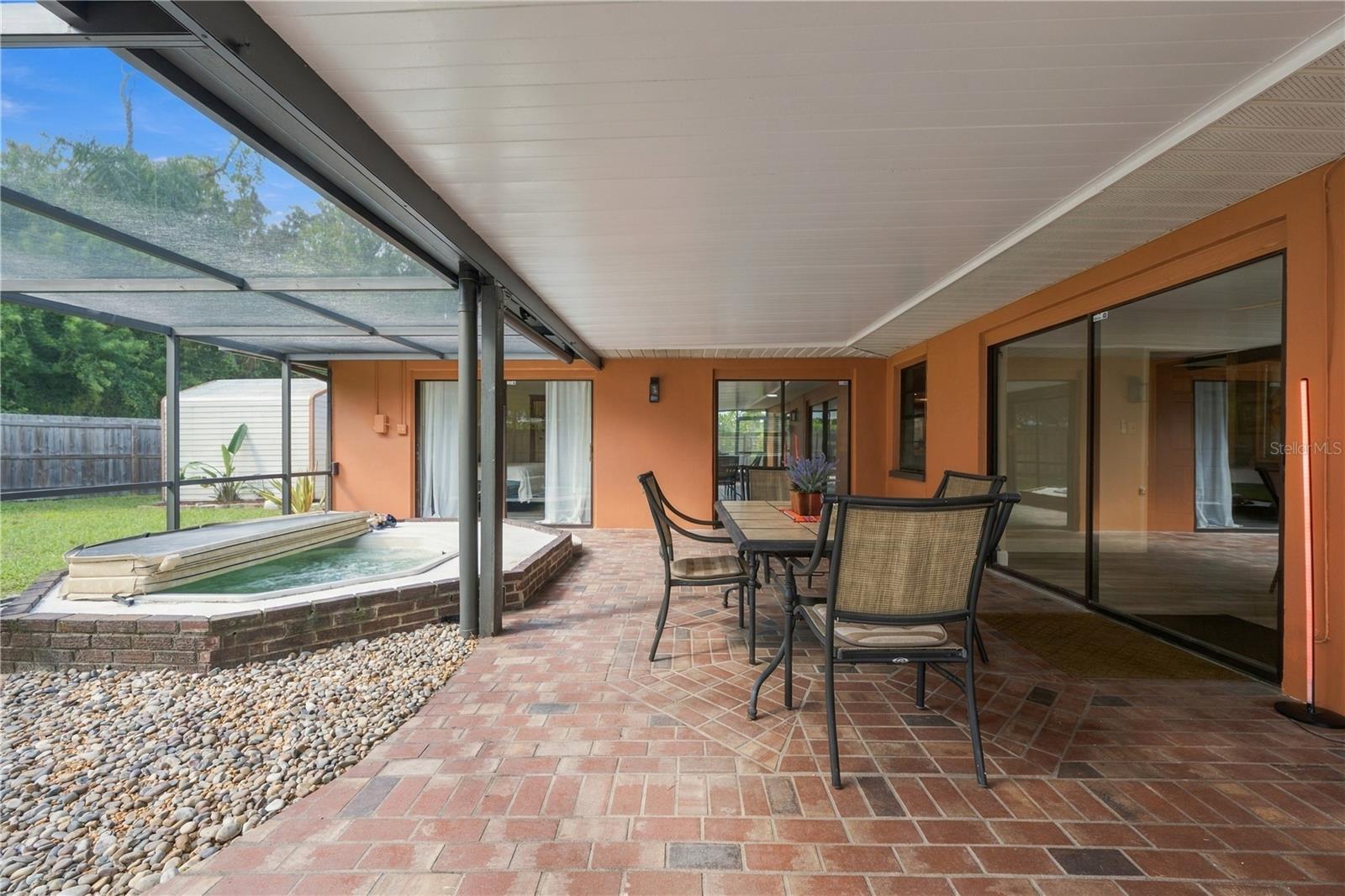 69. Brick Pavers are Perfect for This Extremely Large Lanai.. An Extension of Your Living Space!