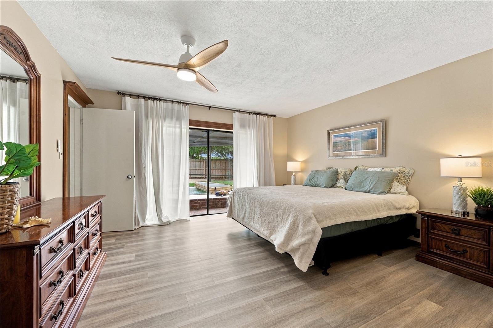 22. Owner's Retreat Features Oversized Sliders to the Lanai.. w a View of the Hot Tub!