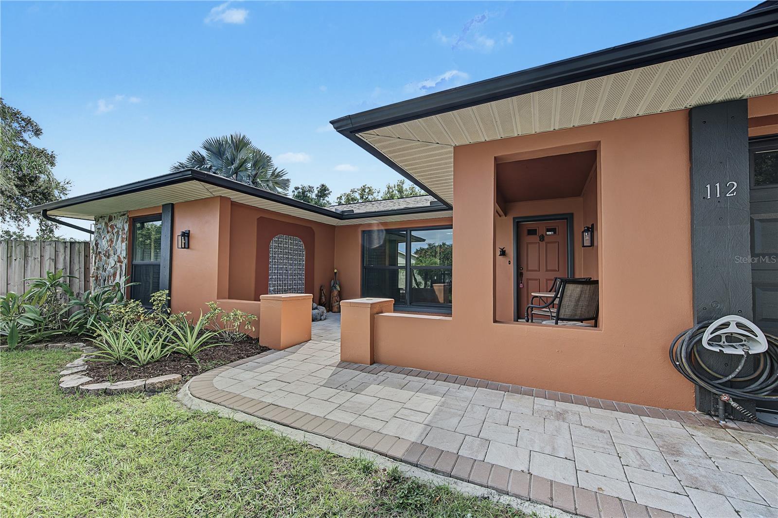 6. Pavers Laid Into Courtyard Entry to Create a QQuaint Front Patio for Outdoor Living!