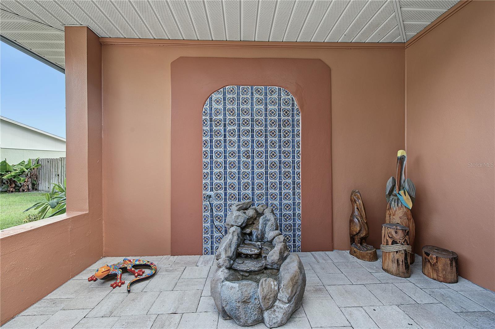 7. Mosaic Tile Inlet is Emphasized w/ Terra Cotta Paint to Accentuate the Unique Design.. the Fountain Trickling Water is a PLUS too..