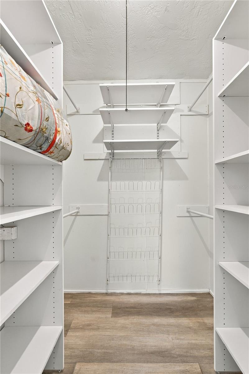 24. Owner's Retreat Walk in Closet (4.9 x 5.7') is Built Out for Maximum Storage!!