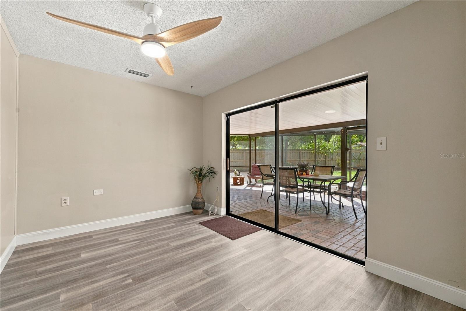 57. BONUS ROOM: (12.3 x 9.1') Features Oversized Sliders Leading to Lanai!