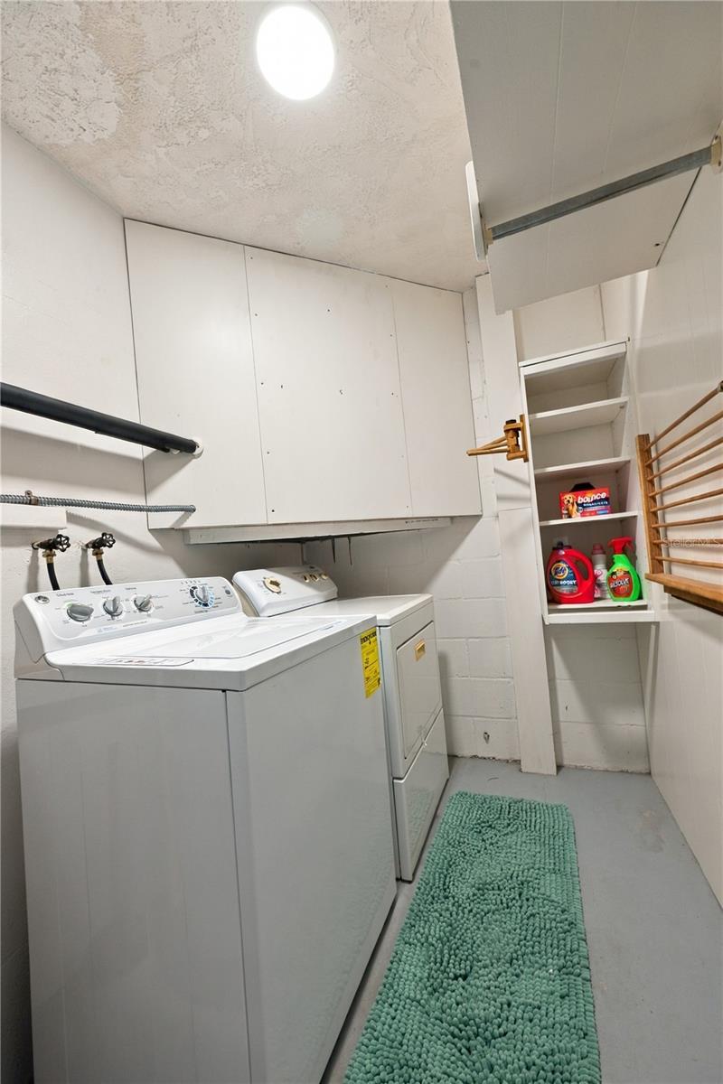 31. Laundry Room (5.8 x 9') is 'in' Kitchen, But Enclosed.. Run a Duct and You Gain Square Footage + Cooler Laundry Room in the Summer!