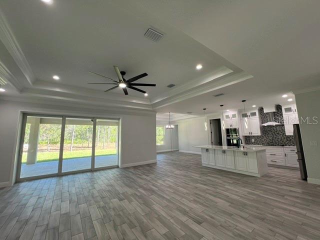 Great Room with view of Kitchen and Dining Room