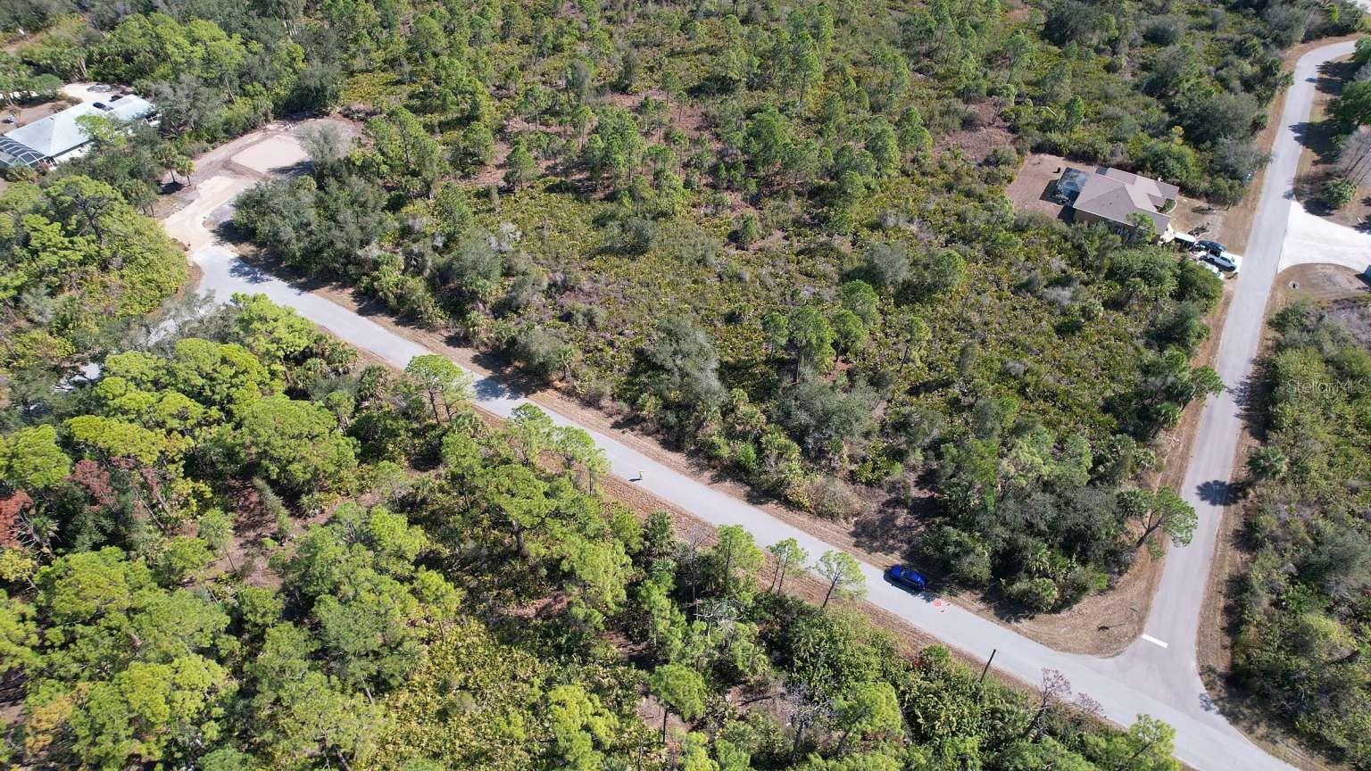 Aerial view of the lot and surrounding roads. Aerial view of the lot and surrounding roads.