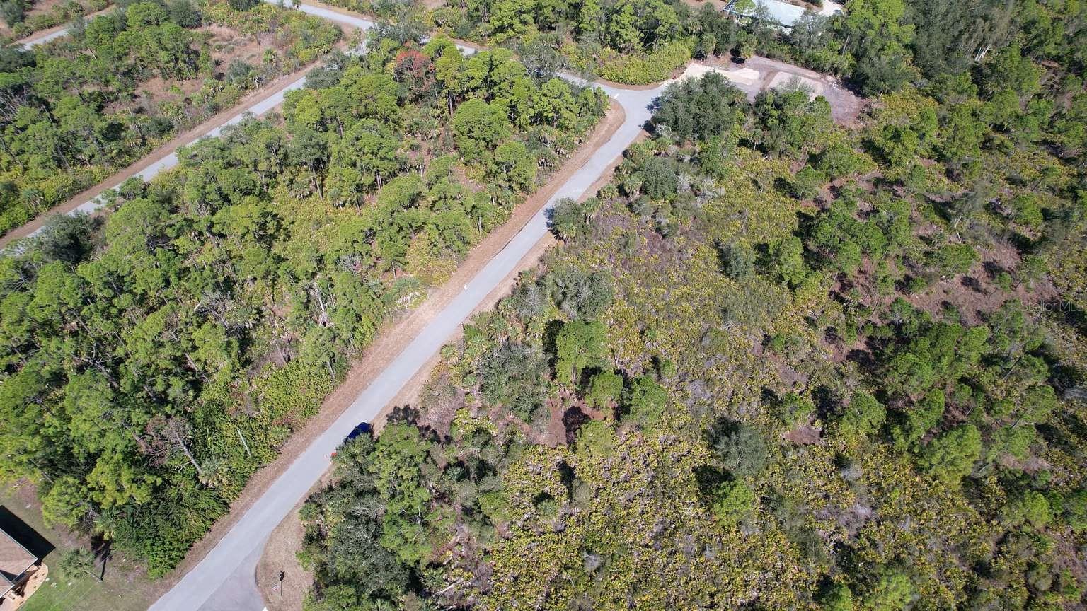 Aerial view of the lot and surrounding roads. Aerial view of the lot and surrounding roads.