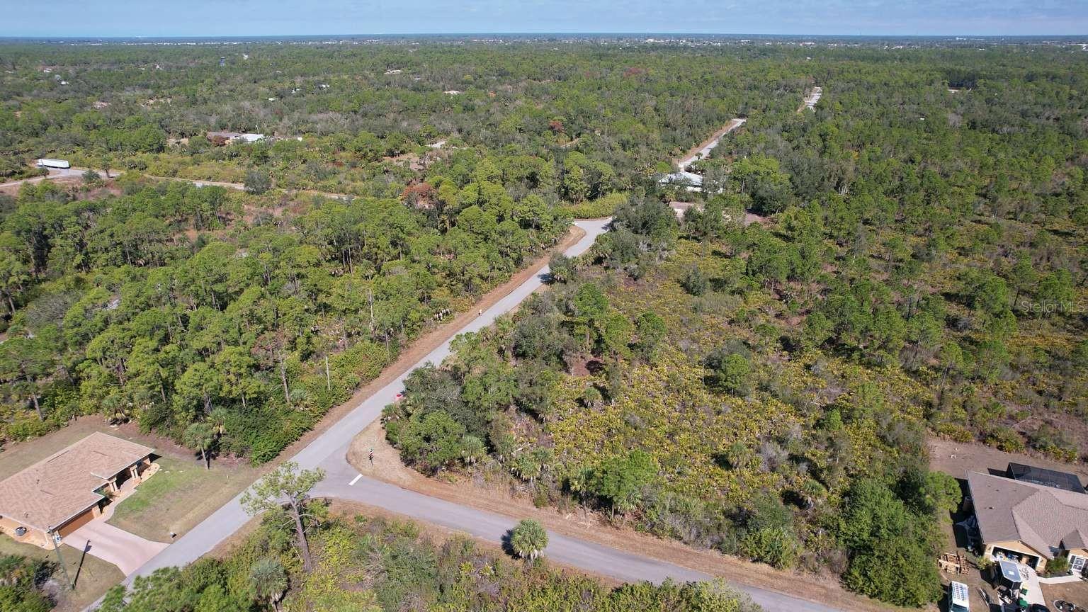Aerial view of the lot and surrounding roads. Aerial view of the lot and surrounding roads.