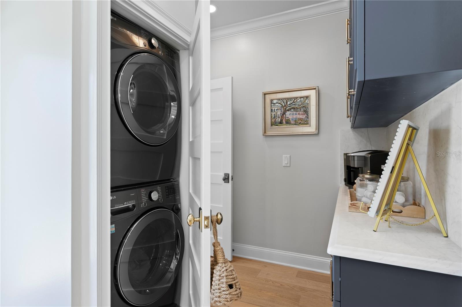 Washer Dryer Set Across from Coffee Bar