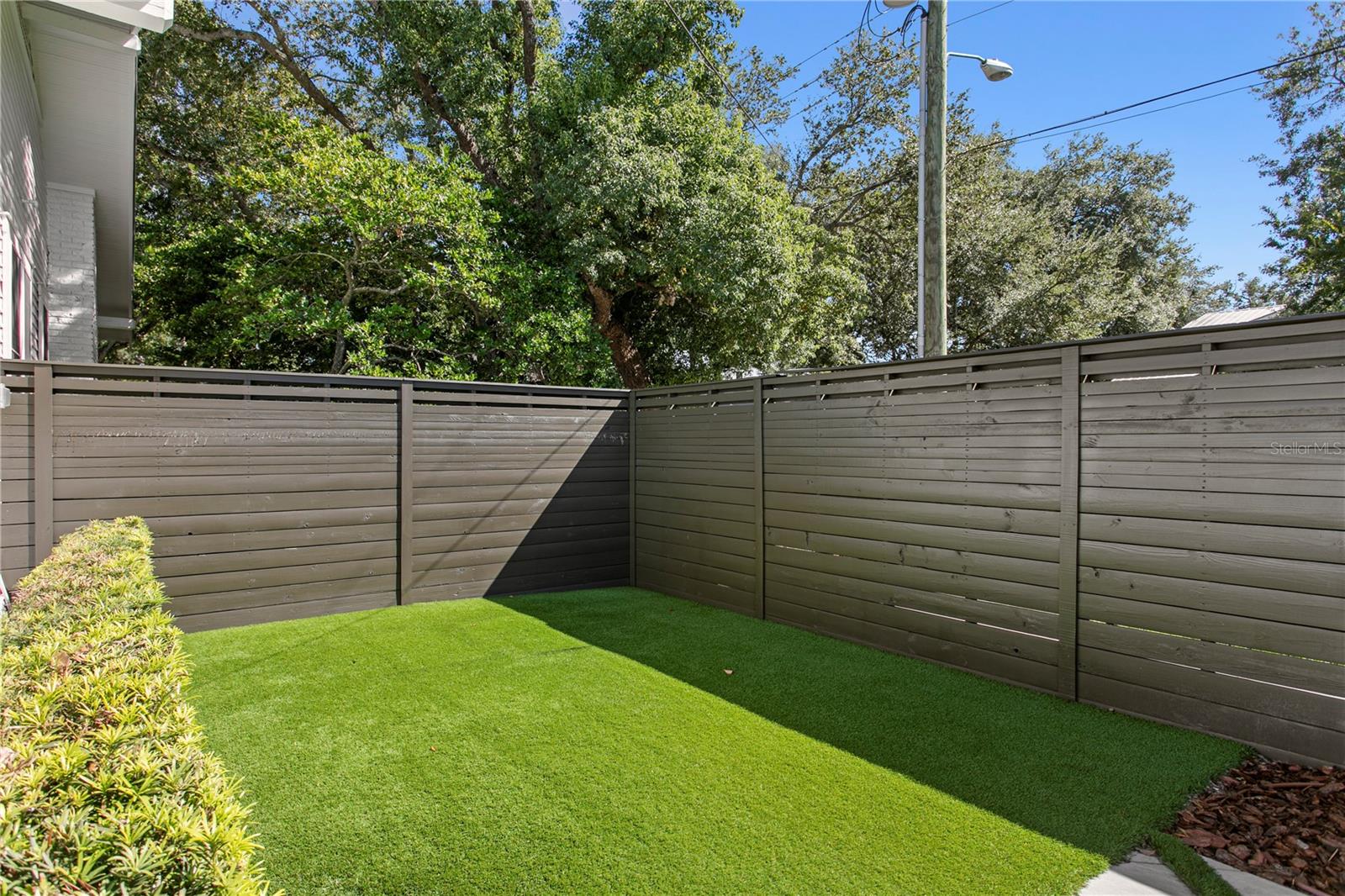 Side yard to play or image a pool