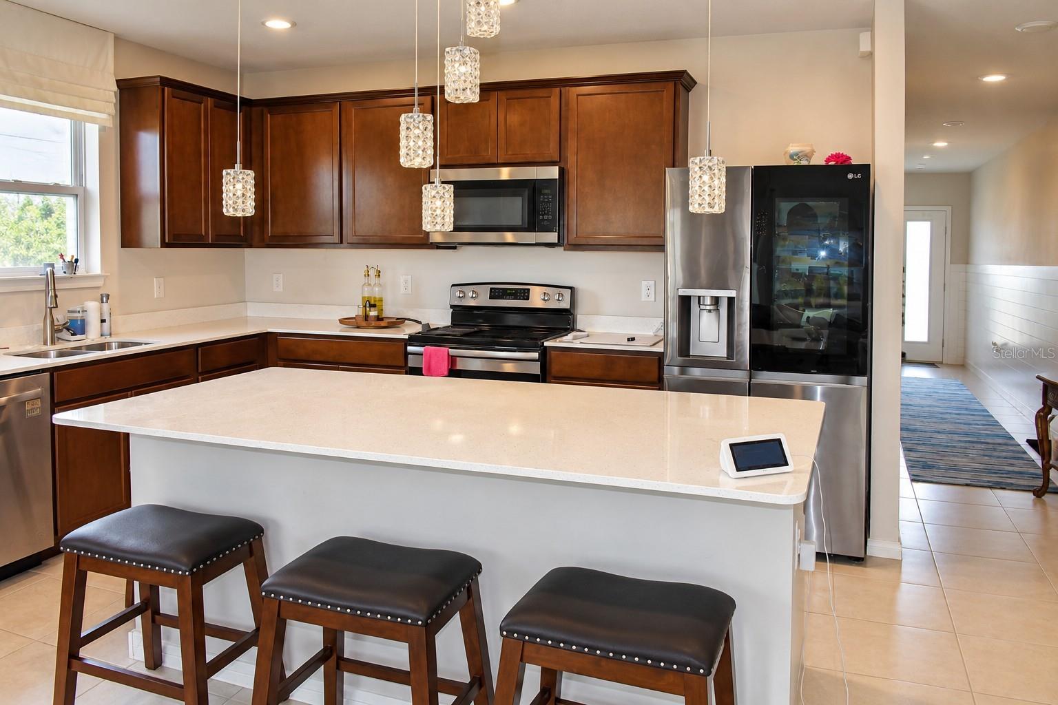 Stainless Steel Appliances and Ample Cabinetry