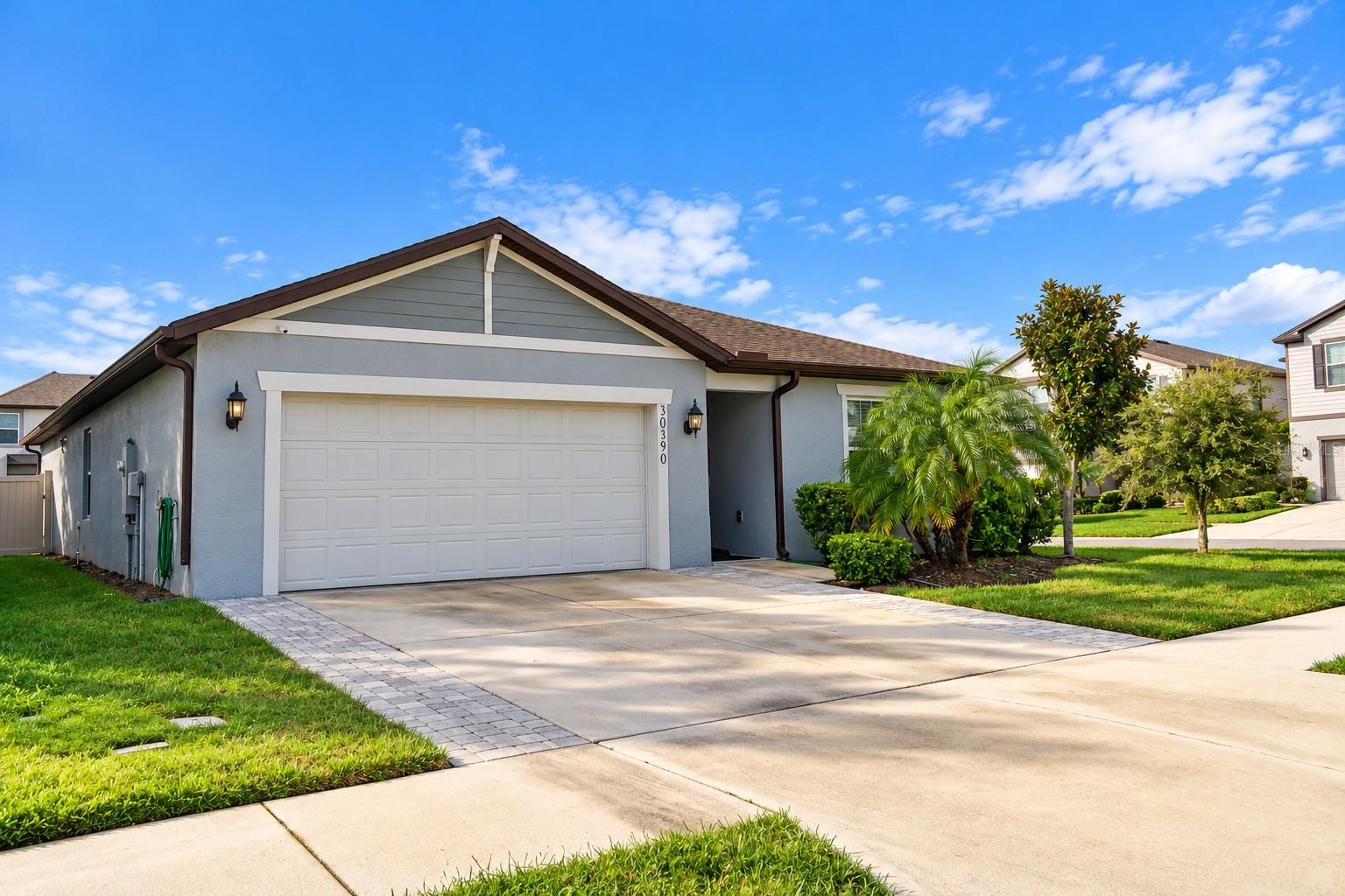 Beautiful Front Exterior with Spacious Driveway Beautiful Front Exterior with Spacious Driveway