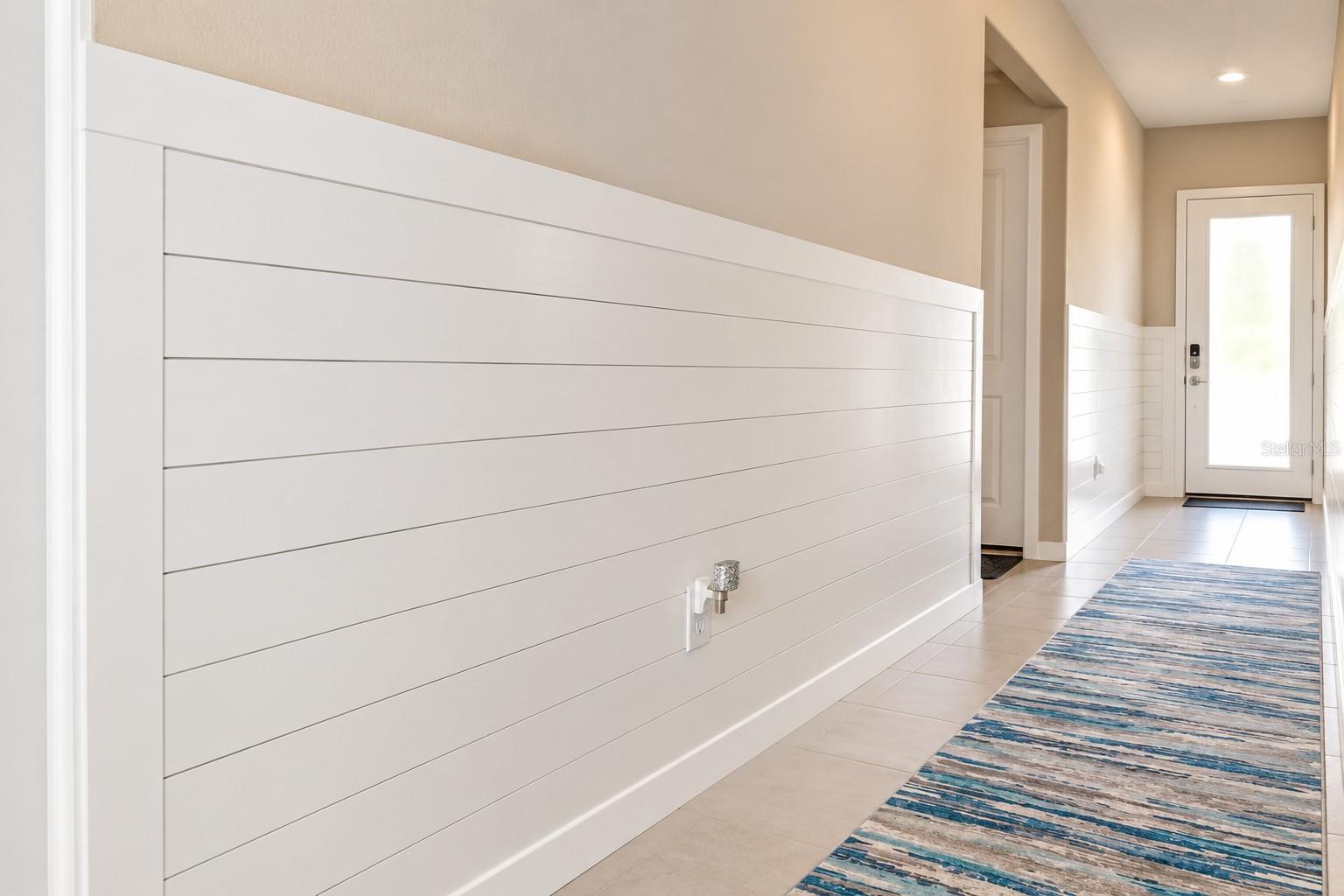 Modern Shiplap Hallway to Bright Entry