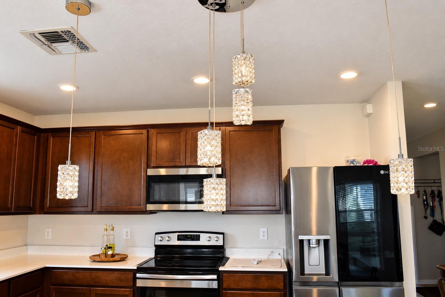 Beautiful Kitchen with Elegant Pendant Lighting